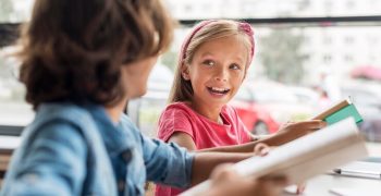 friends-working-together-their-homework-library_23-2148694754